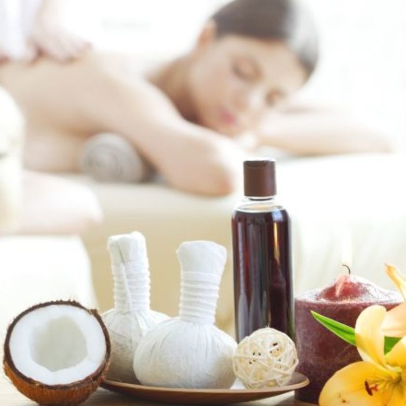 Hot coconut oil massage