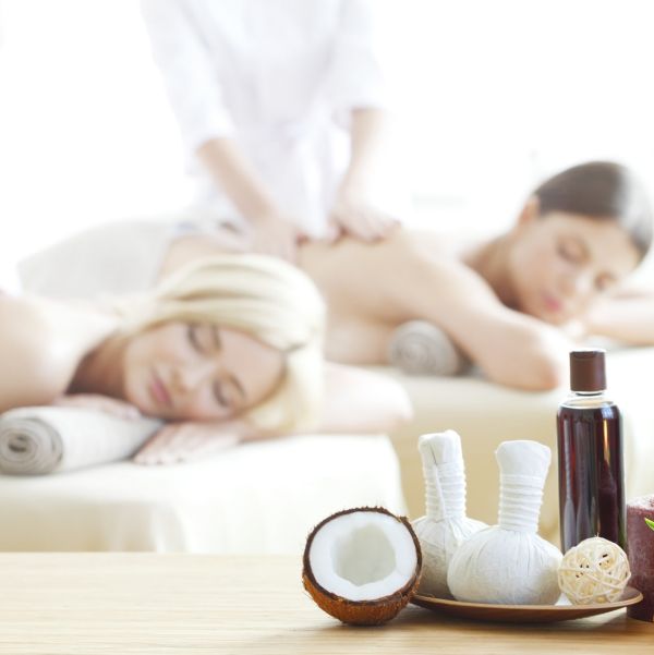 Hot coconut oil massage